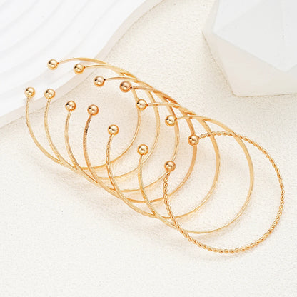 Elegant 7-Piece Geometric Bracelets Set - Open-Ended Design for Chic Layering