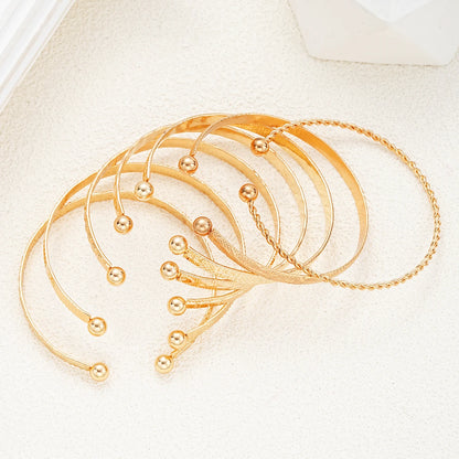Elegant 7-Piece Geometric Bracelets Set - Open-Ended Design for Chic Layering